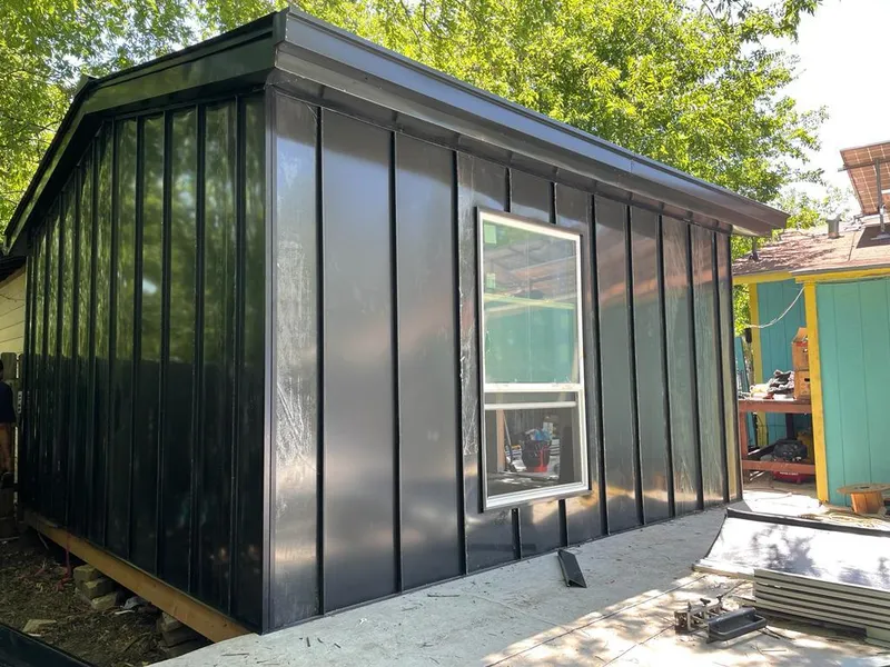 Black standing seam metal wall panels for Roof Inspection in El Mirage